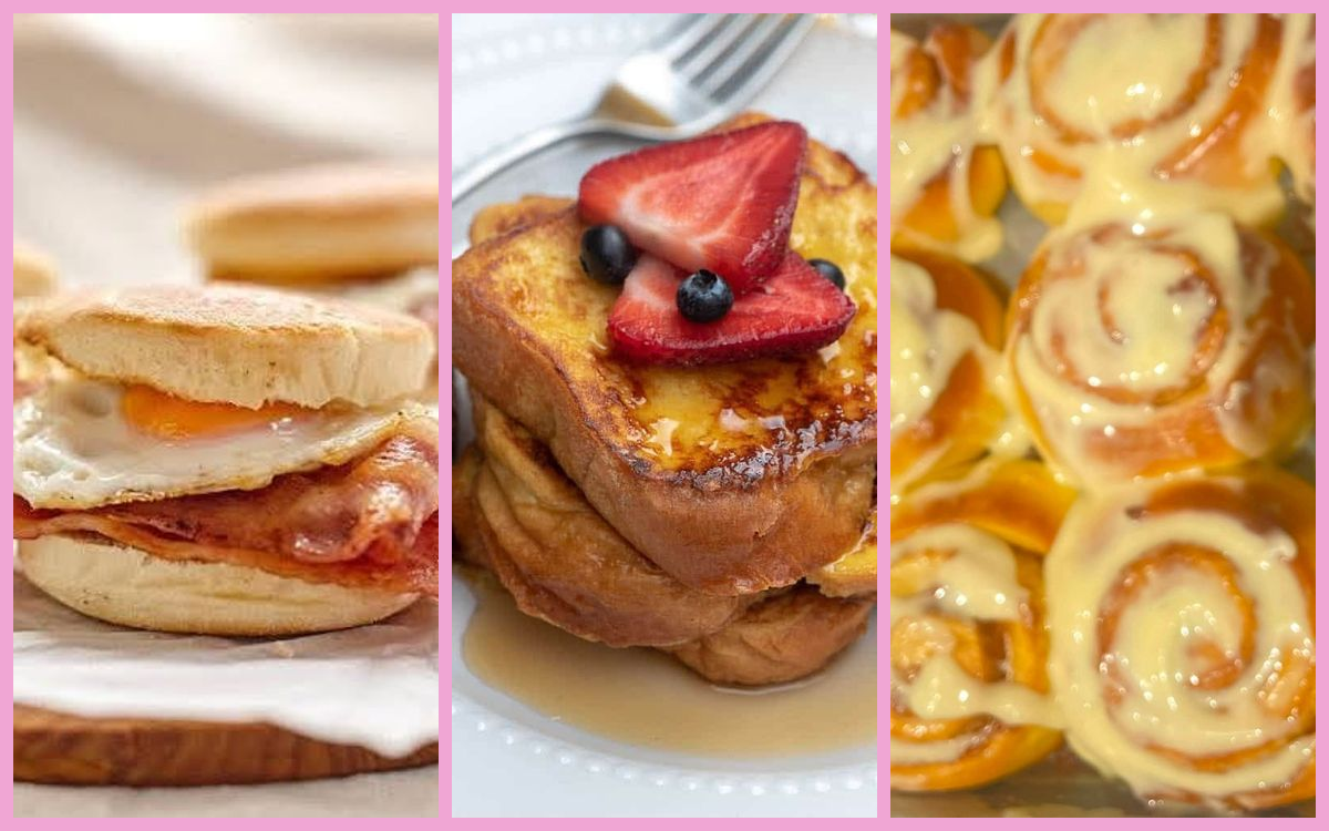 Three cafe dishes side by side: a bacon and fried egg muffin, a stack of French toast with strawberries and syrup, and a tray of iced cinnamon buns